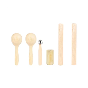 Комплект ударни инструменти от шест, художествена пръчки, пясъчна тръба за пръст, пясък, чук с камбана на една клечка.
